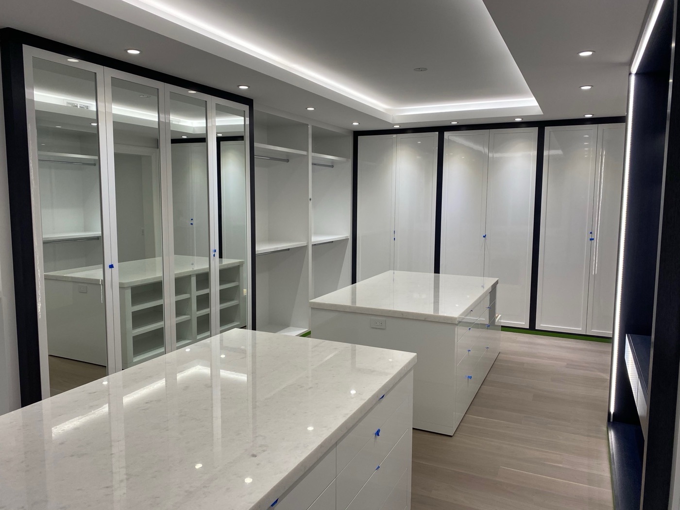 Walk-in closet with marble island