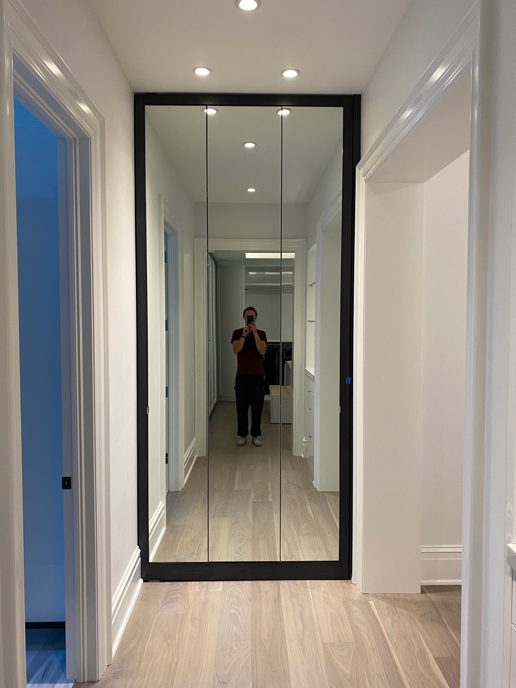 Curved mirrored closet door
