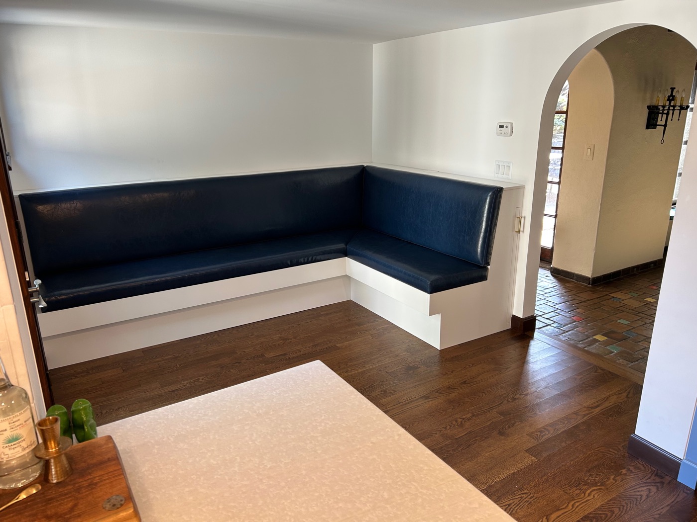 Built-in navy leather banquette seating