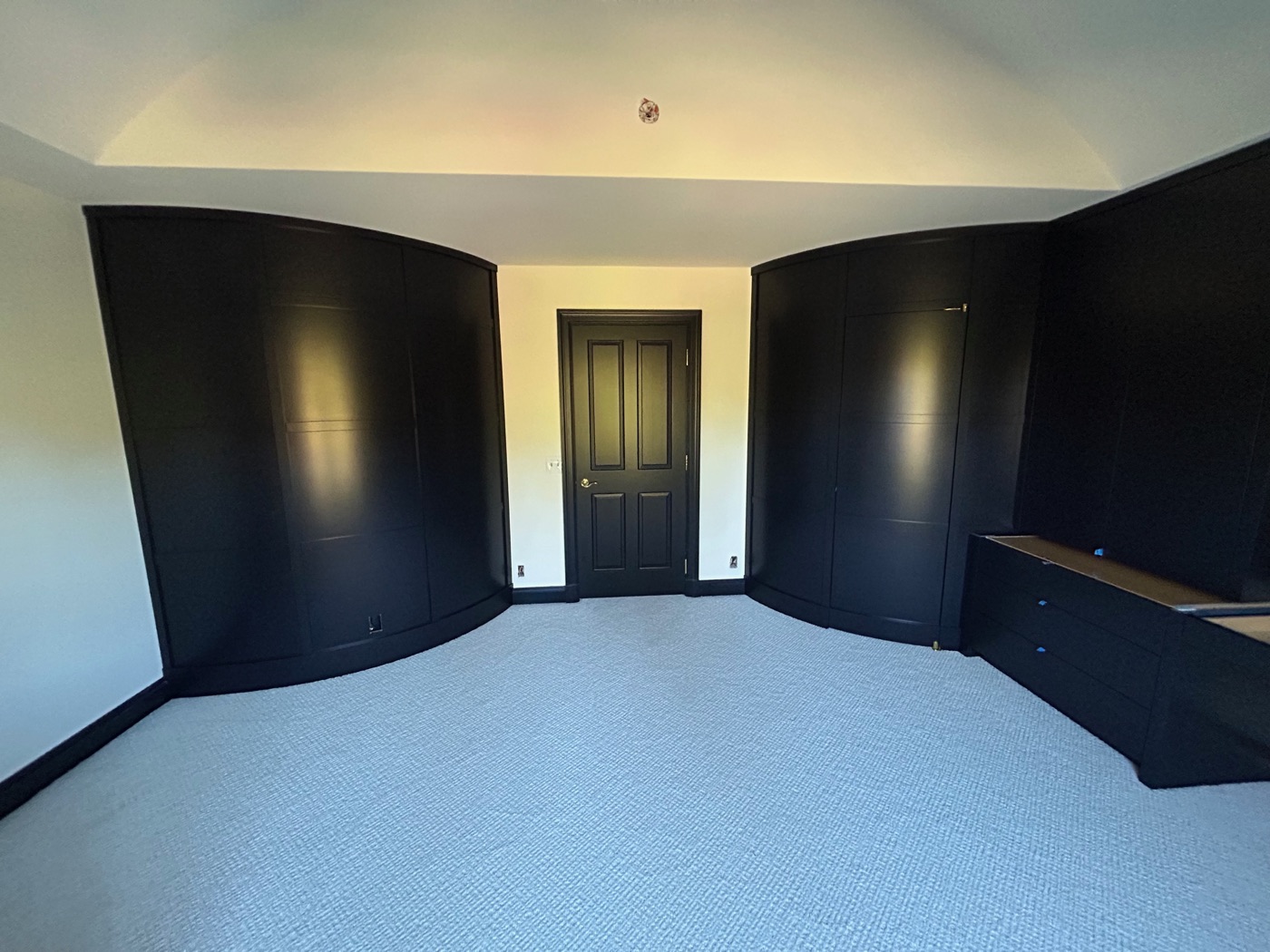 Symmetric wraparound closet with center door