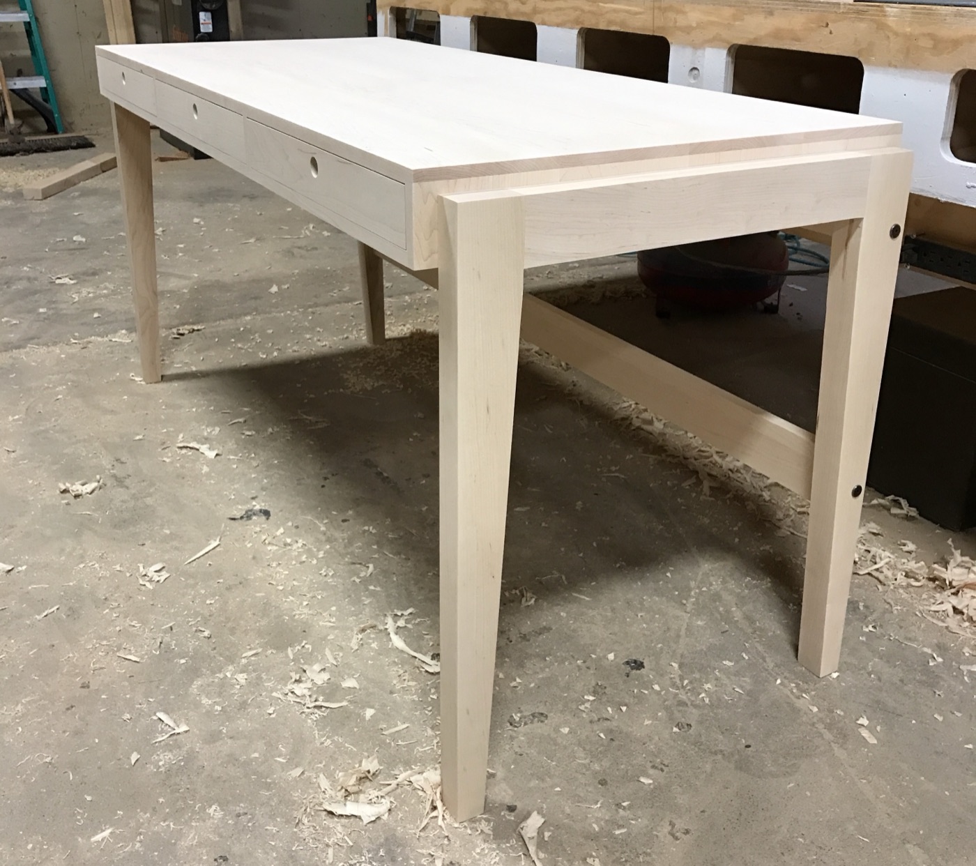 Maple farmhouse table with tapered legs