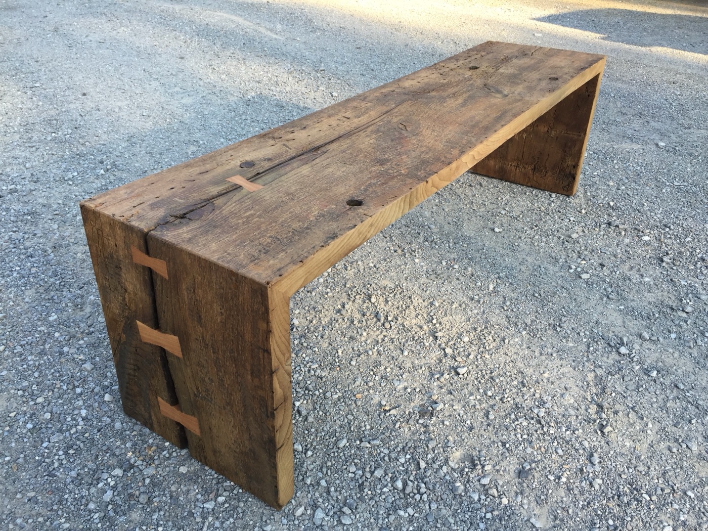 Reclaimed timber bench with bowtie joinery