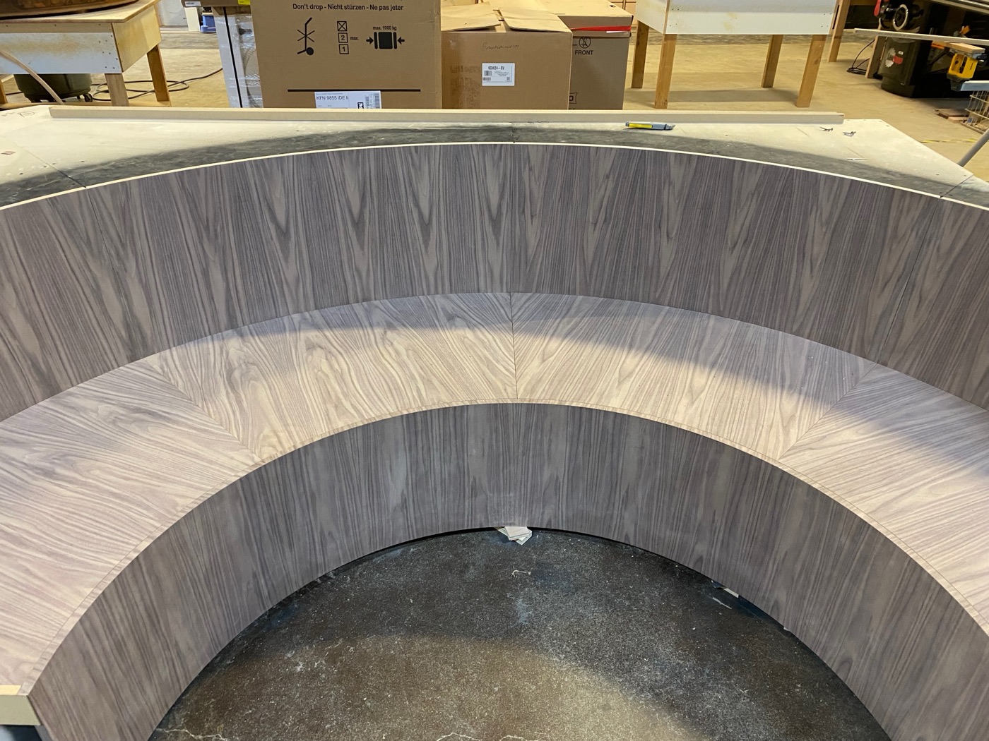 Curved half-round wood bench seating