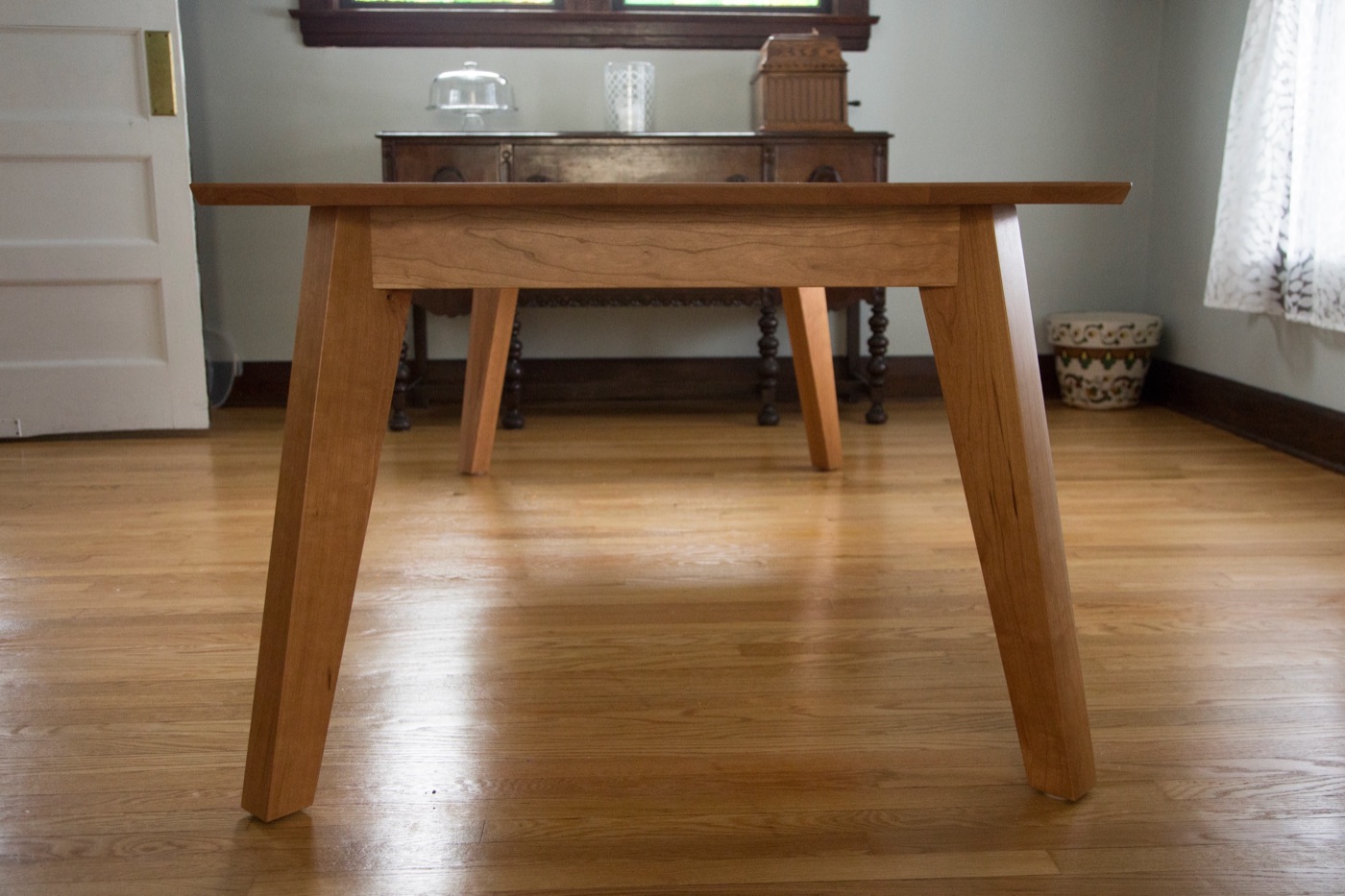 Maple table with chairs in dining room